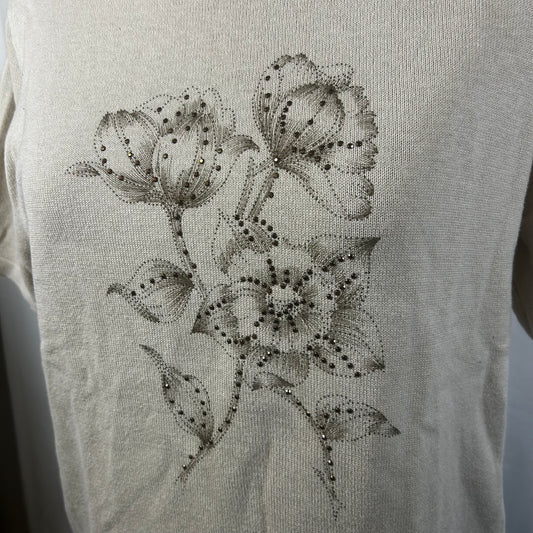Beige top with flower detail