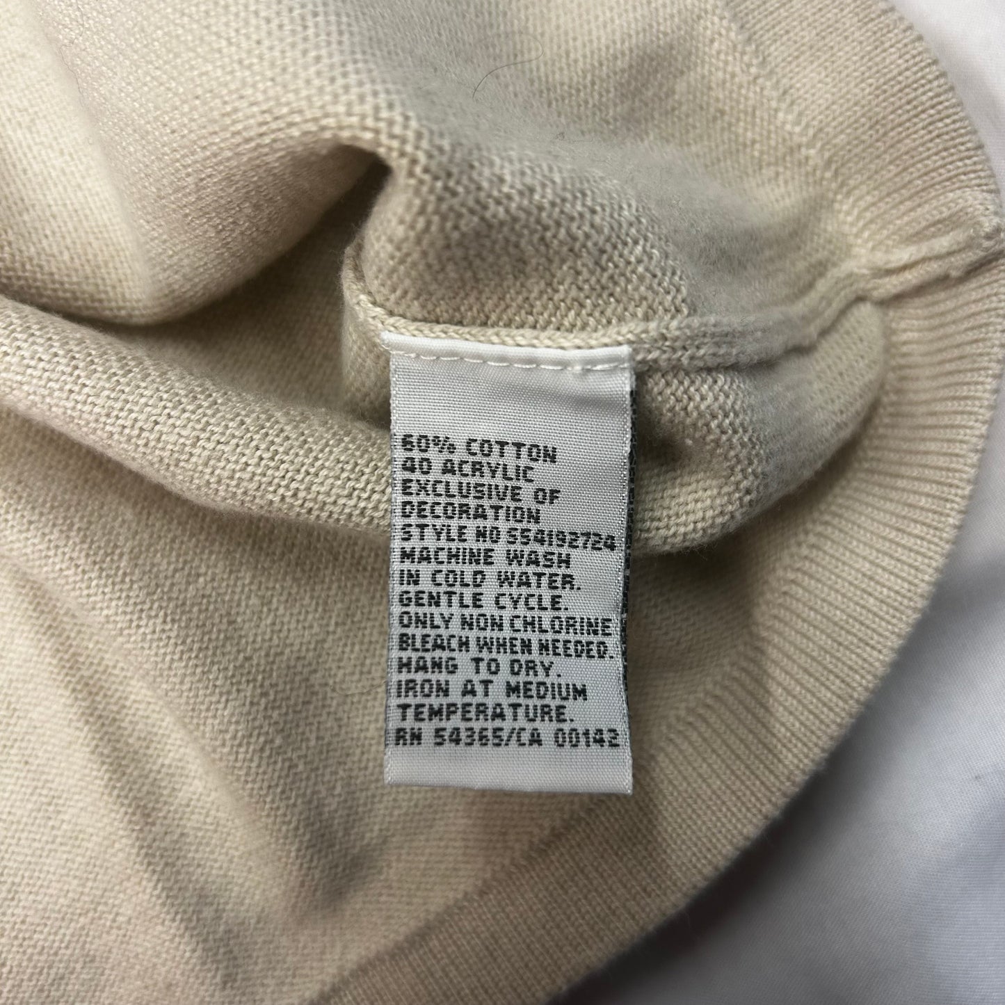 Beige top with flower detail