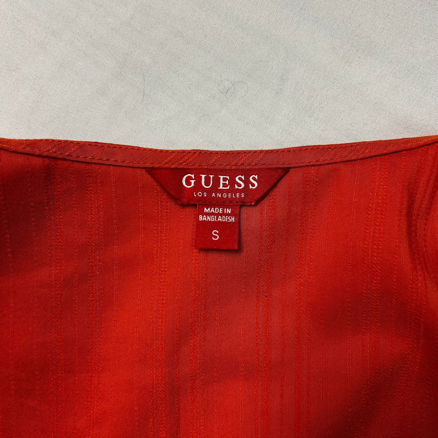 Orange Guess zipper shirt
