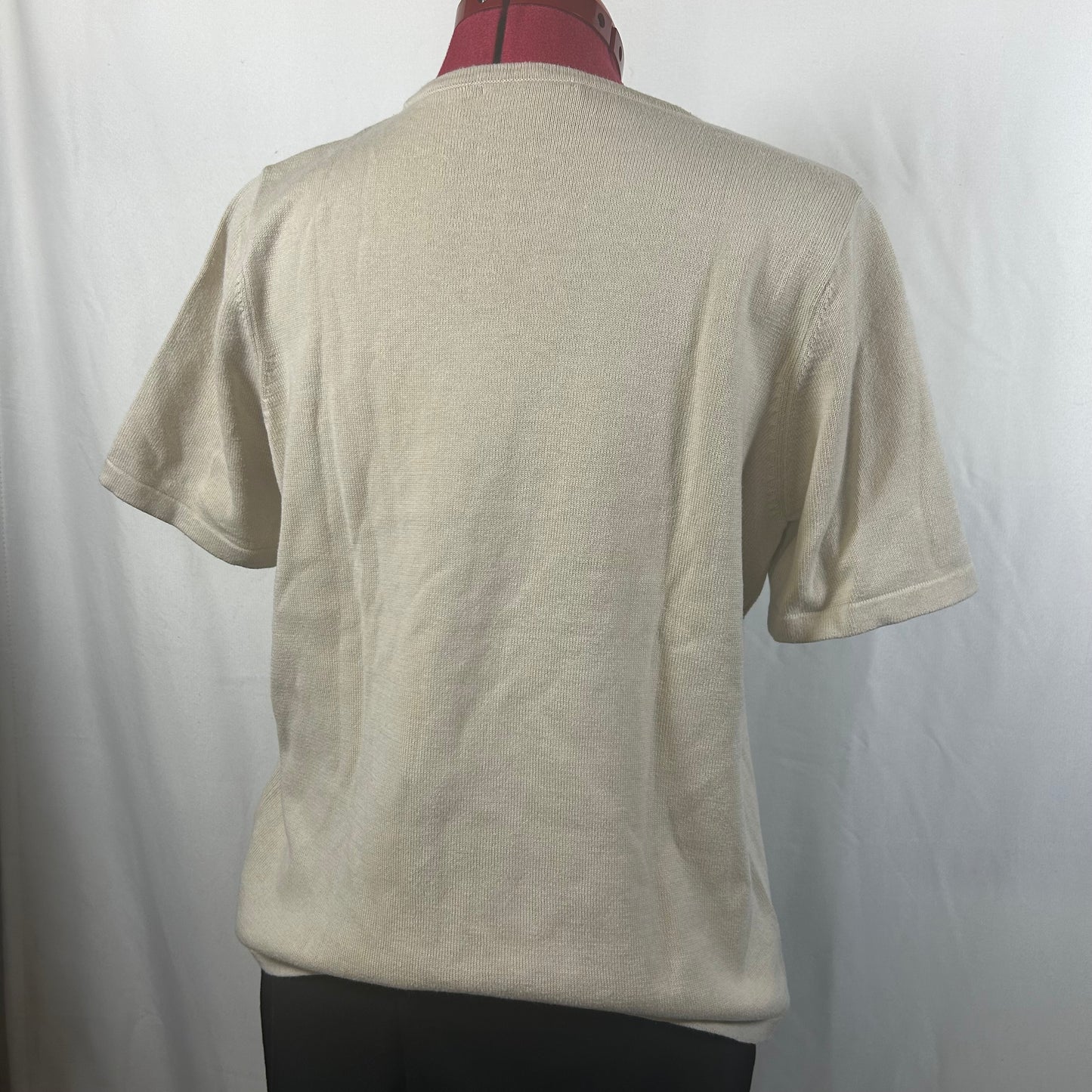 Beige top with flower detail